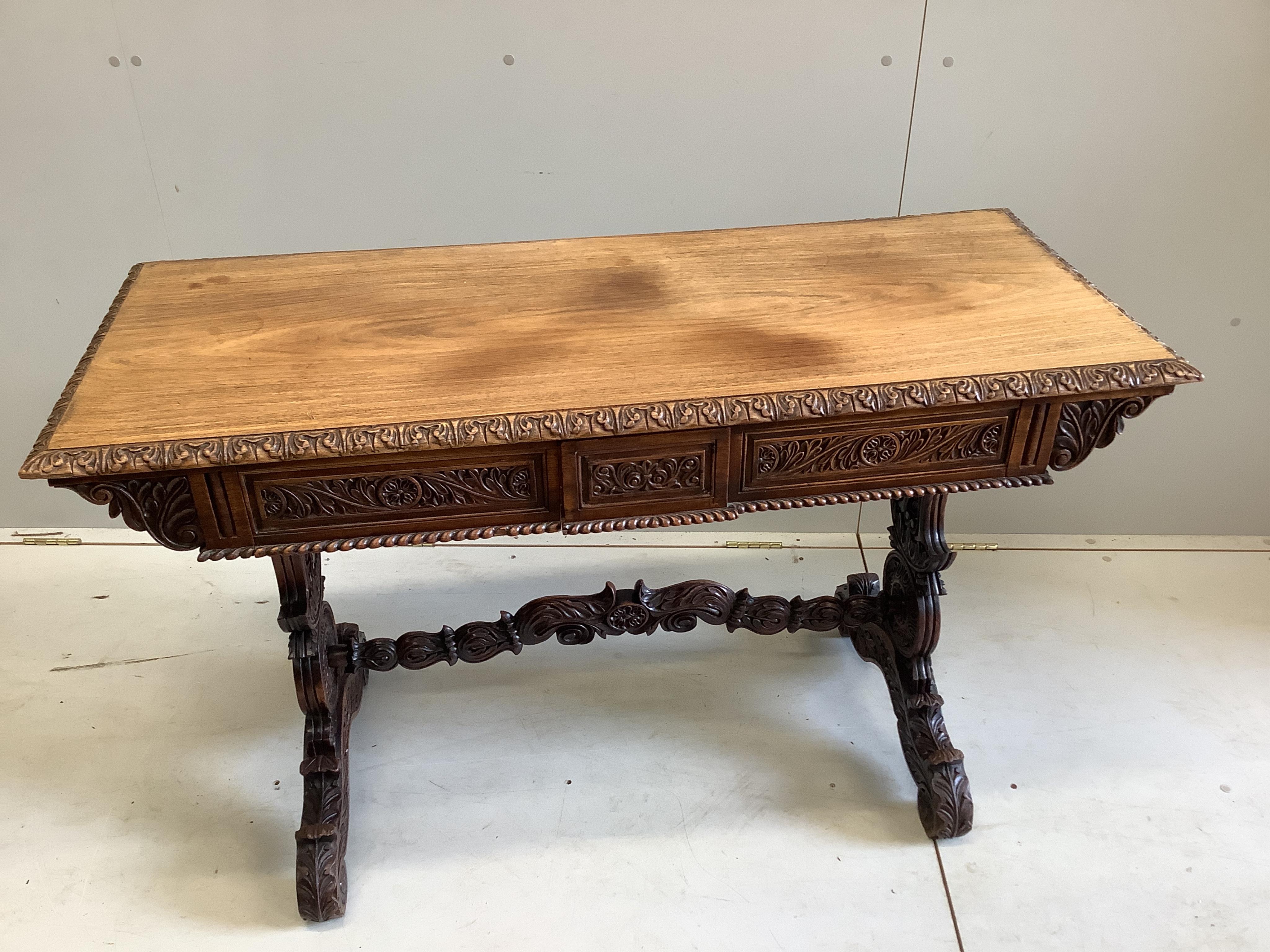 A 19th century Anglo Indian rosewood two drawer centre table, width 120cm, depth 50cm, height 75cm. Condition - fair